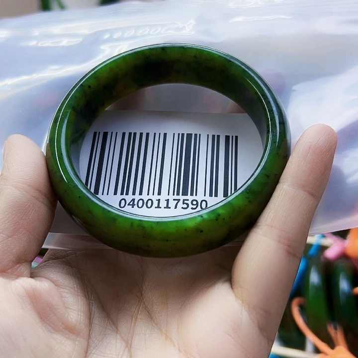 黄***邪和田玉未镶嵌手镯包容