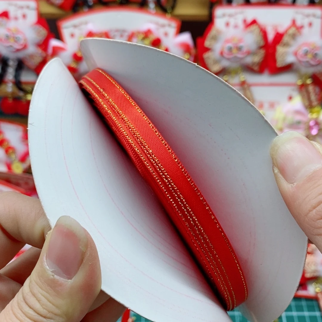 0.6金边涤纶带红色一卷50码