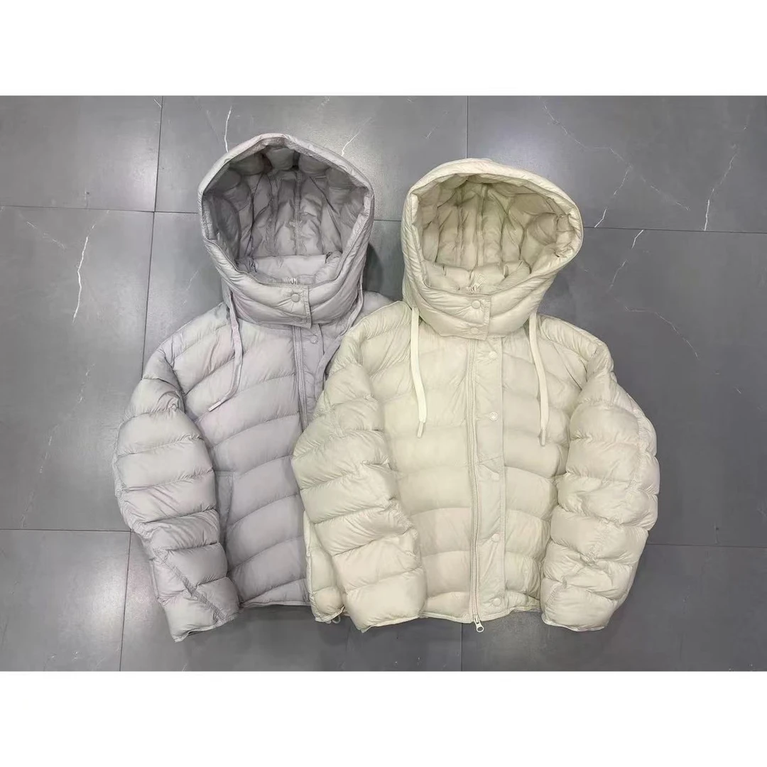 弯刀袖连帽羽绒服