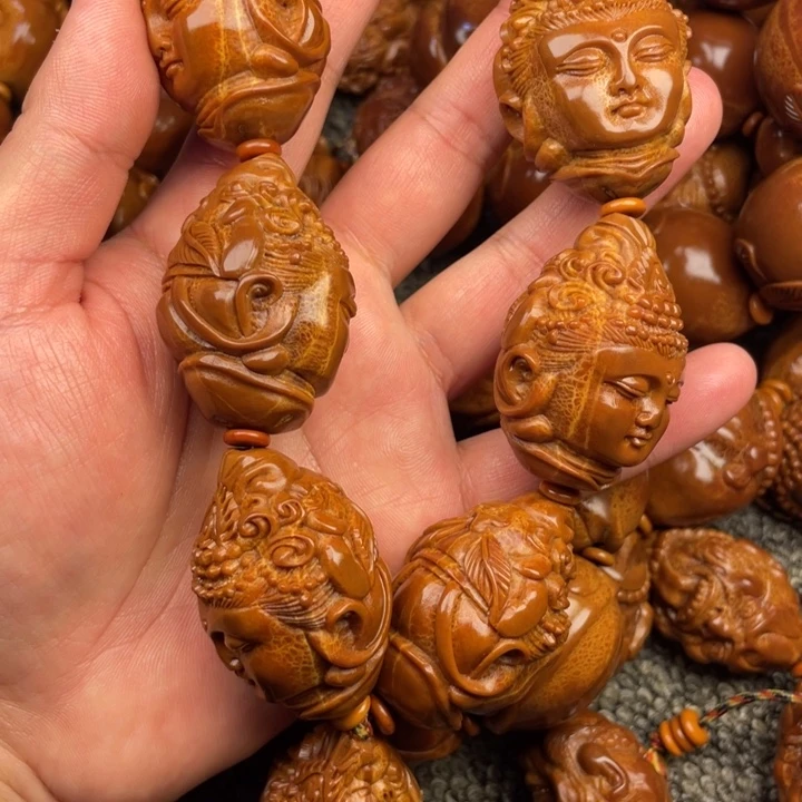 橄榄核吊坠余**子橄榄核手持