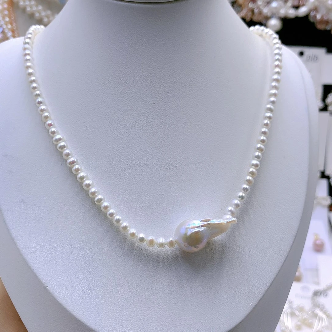 银S925镶嵌耳饰淡水珍珠是**吖