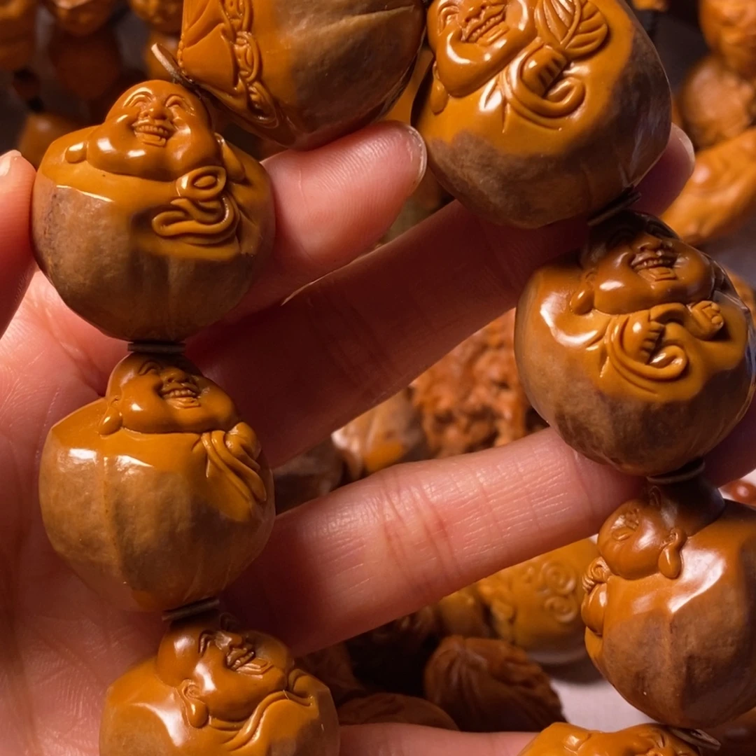 瑞***器手串/手链橄榄核包衣弥勒精品