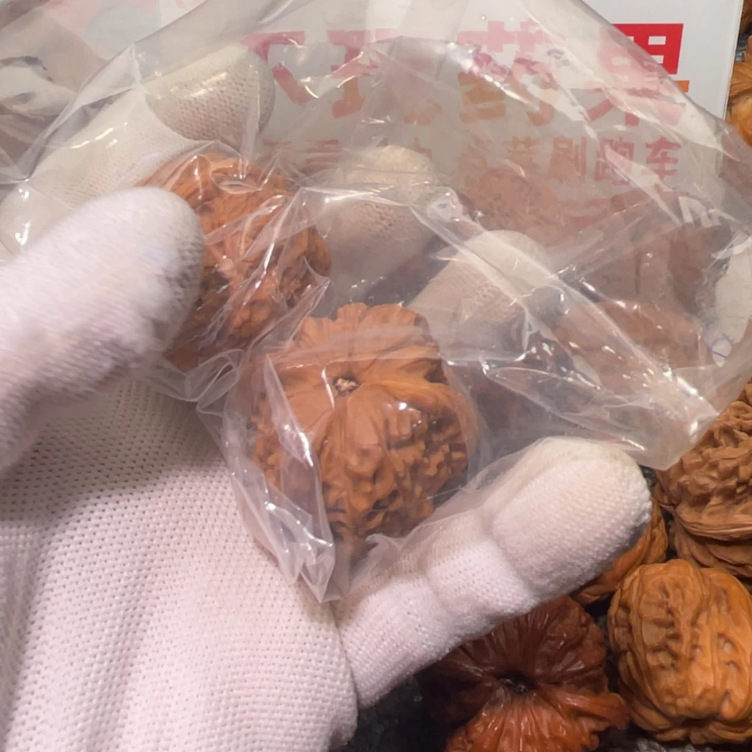 桃核吊坠北****?麒麟