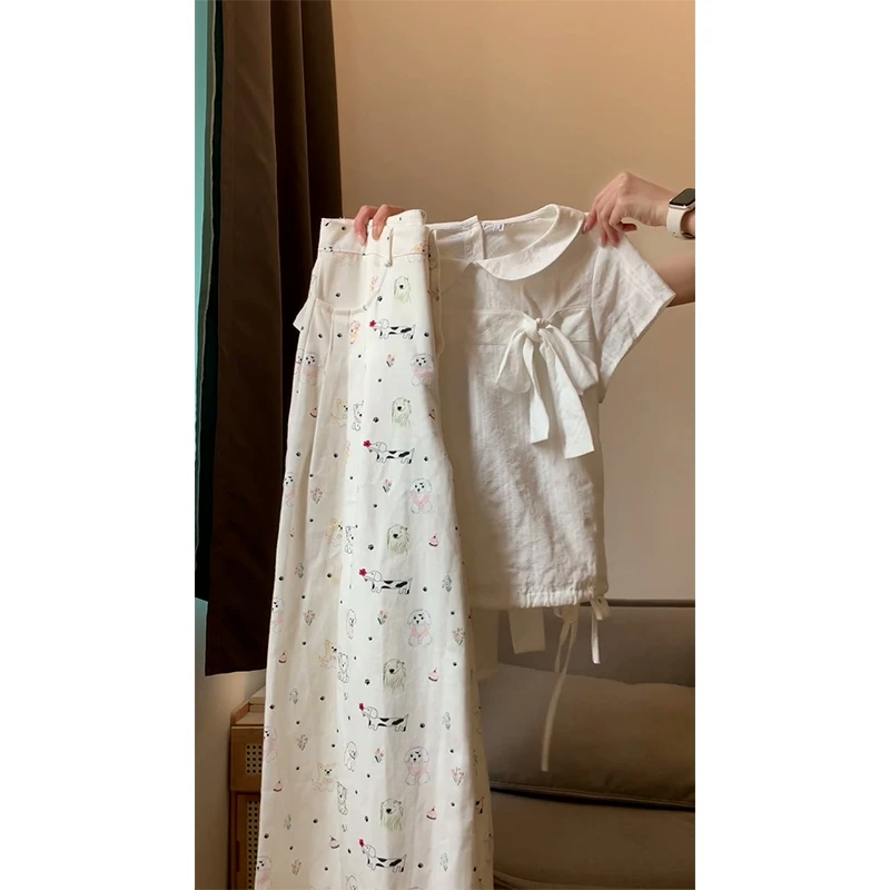 韩系chic白色蝴蝶结绑带上衣女夏季新款设计小狗图案阔腿长裤套装