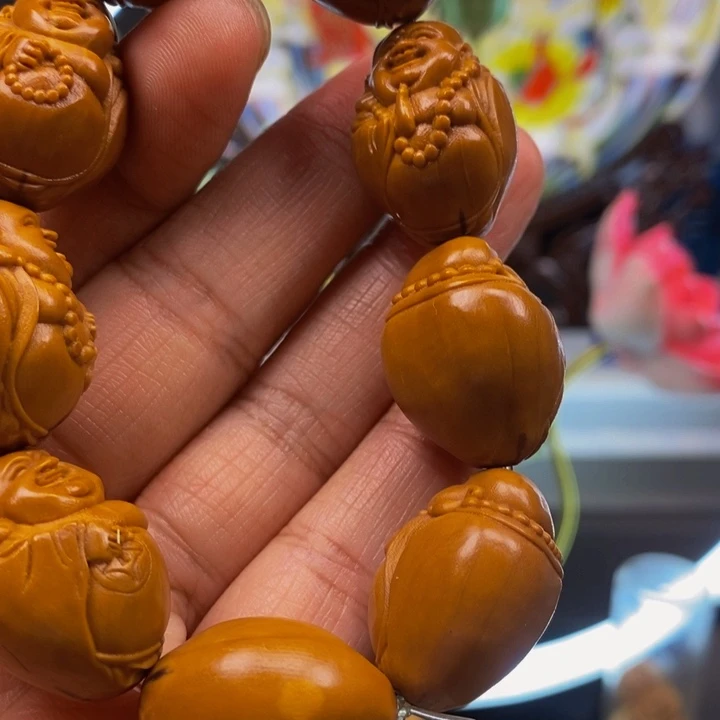 橄榄核吊坠哦哦哦哟哦哦杨杨哟哟哟