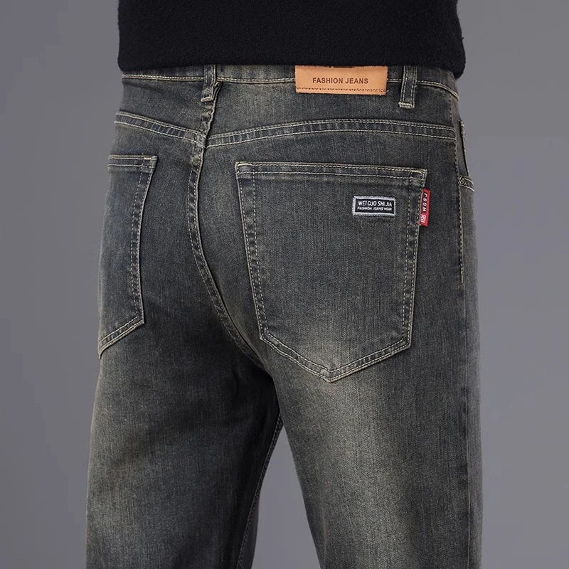 Leekody香港高端水泥灰复古牛仔裤男秋冬款新款修身商务弹力长裤
