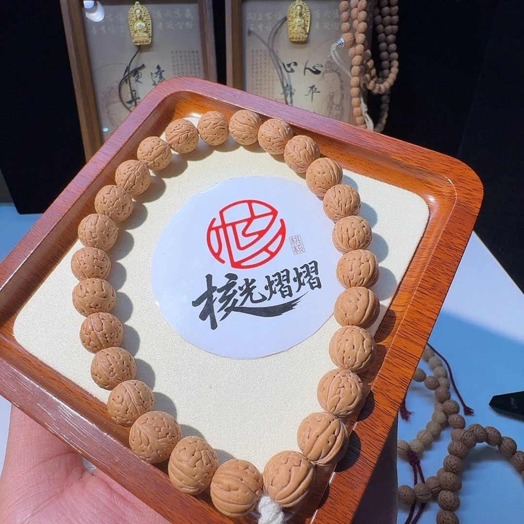 黑***）吊坠桃核野生宽脐肌肉