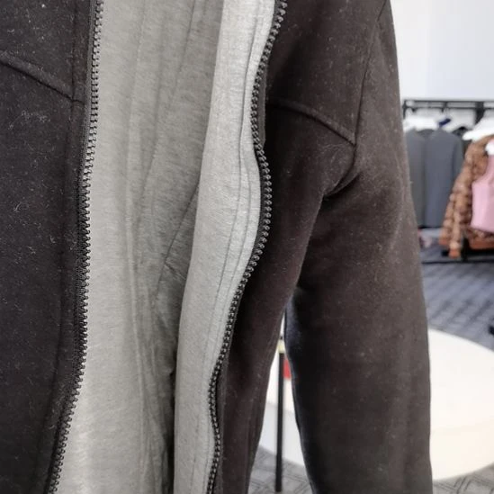 果***脆女士黑色双层驼绒上衣