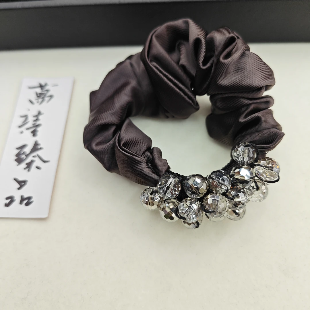 咖色西瓜珠发圈389 yb