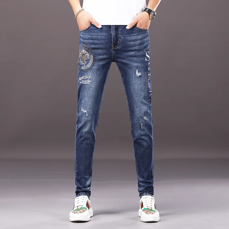 【臣吾】欧美高端刺绣烫钻破洞牛仔裤男2025秋季潮牌修身小脚裤弹力