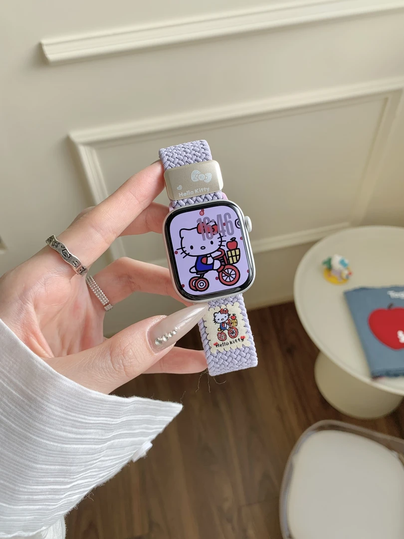 可爱KT踩单车尼龙编织适用苹果appleiWatchs10s9s8s765表带SE21女