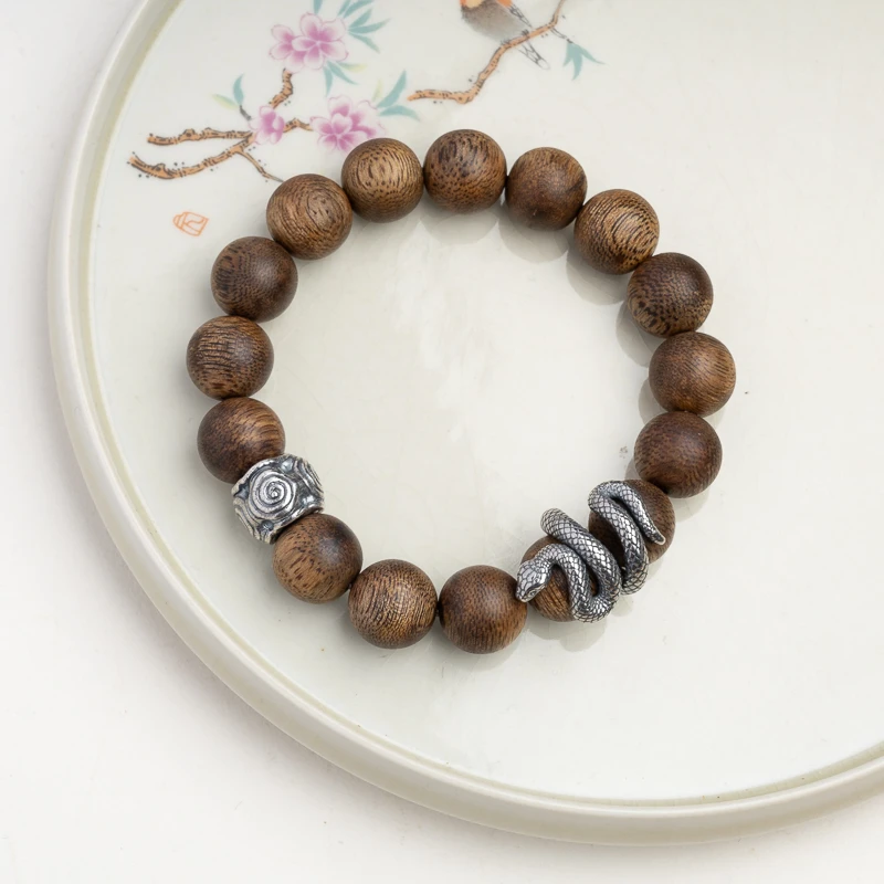 沉香莺歌绿奇楠沉香12mm足银小蛇配饰单圈手串