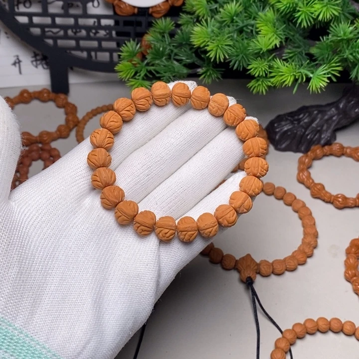 桃核手串凤羽手串