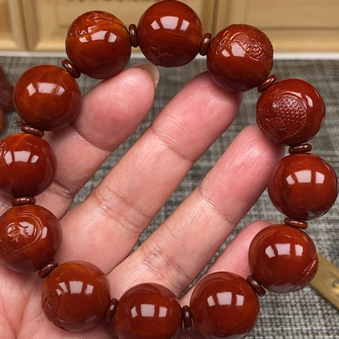 慎***独橄榄核吊坠连年有余