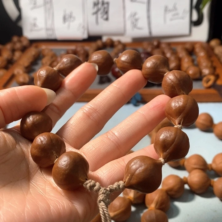 橄榄核手串9171精品蒜头铁核鸡血红12+1颗