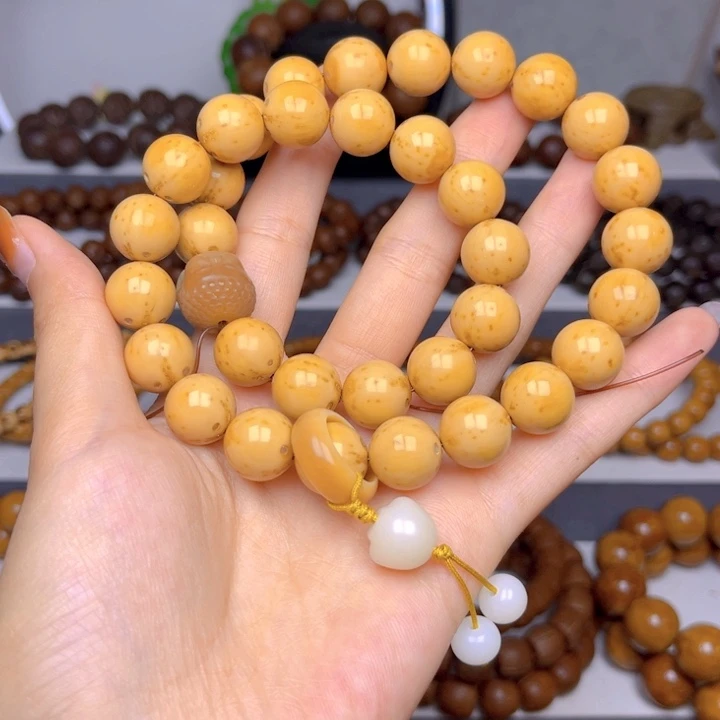 D***.手串紫金鼠光珠差价