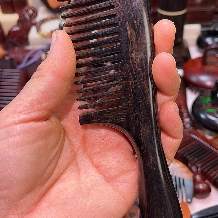 巧***生黄花梨/降香黄檀乌木大梳子
