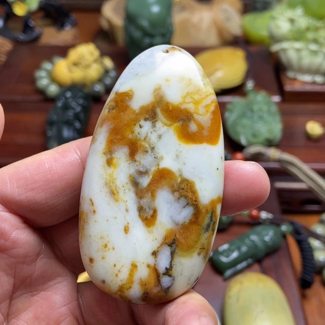 蛇纹石玉手把件未镶嵌