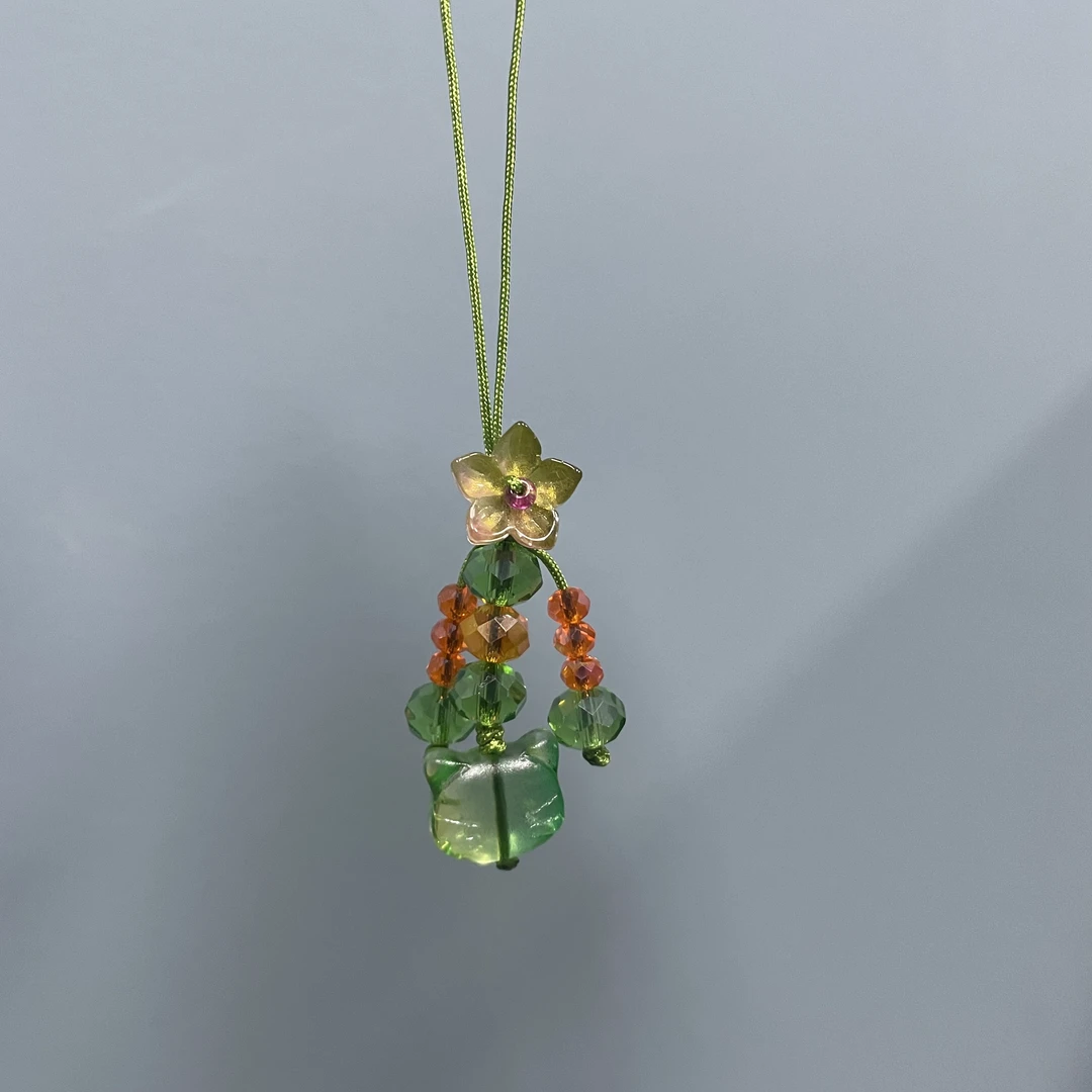 绳款绿色猫头手机坠D859