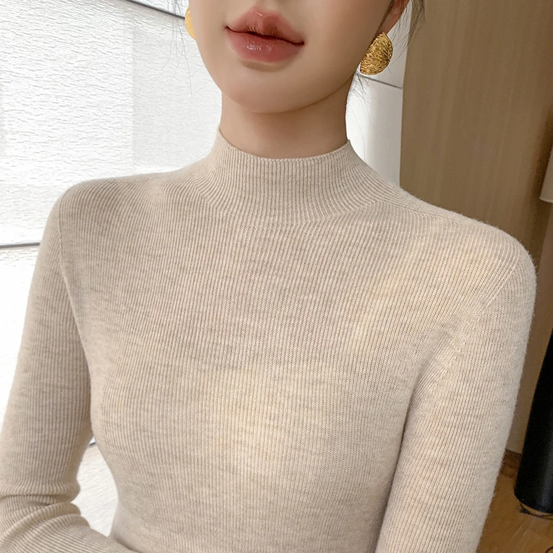 鄂尔多斯市2025秋冬无缝100%羊绒衫高档女半高领针织毛衣修身打底