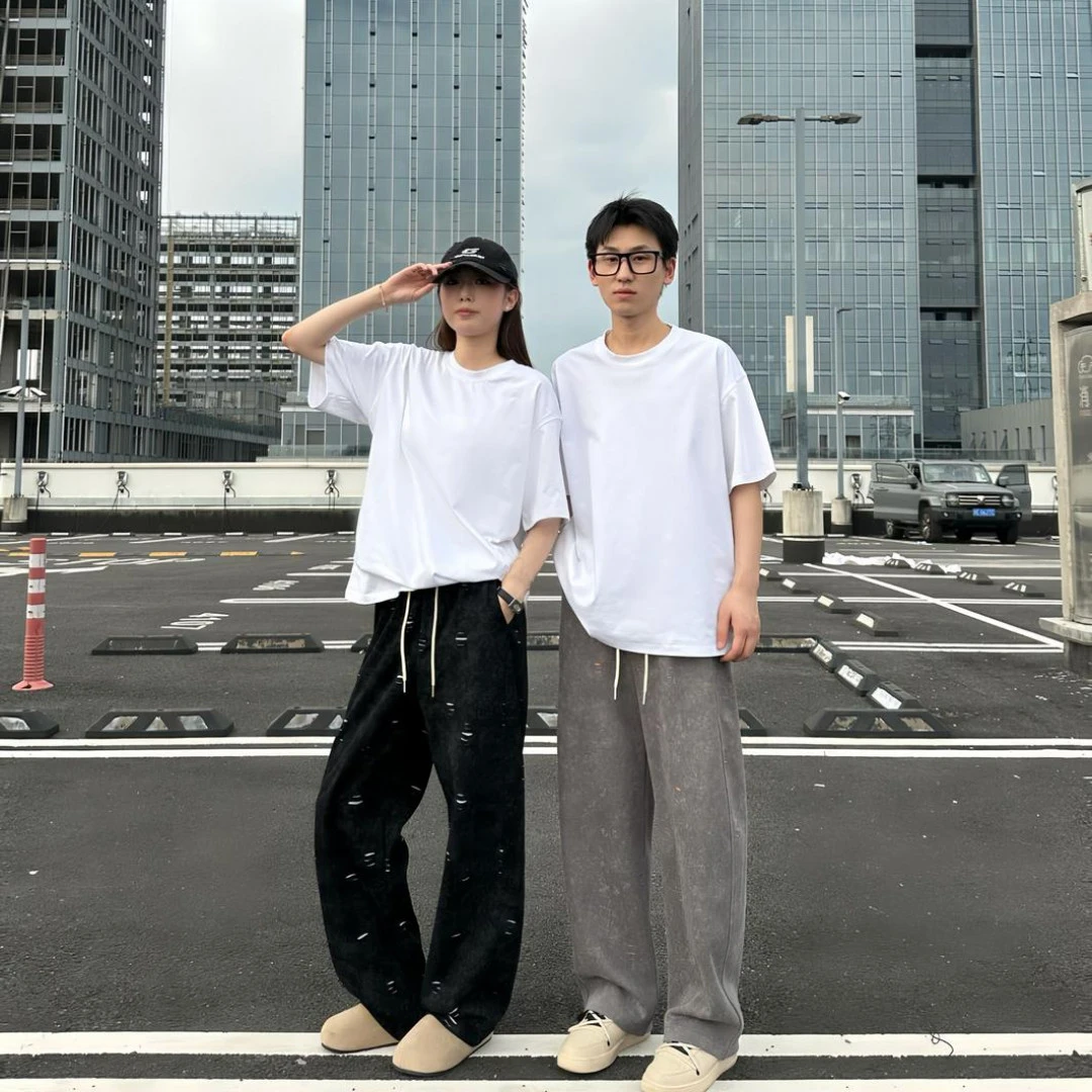 春秋撞色卫裤不规则破洞弯刀裤直筒长裤秋季卫裤男潮流ins休闲裤