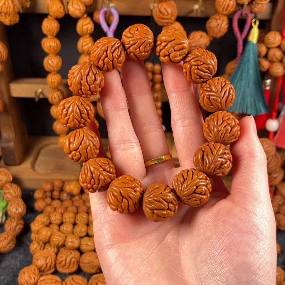 吊坠桃核桃枭手串