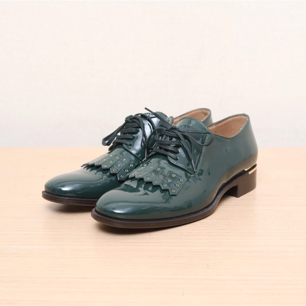 99新 FERRAGAMO/菲拉格慕 小花Jerry活动鞋子 墨绿色 36.5码