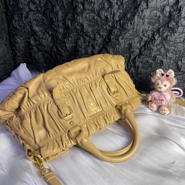 95新 Prada/普拉达 普拉达黄色褶皱手提托特包斜挎包