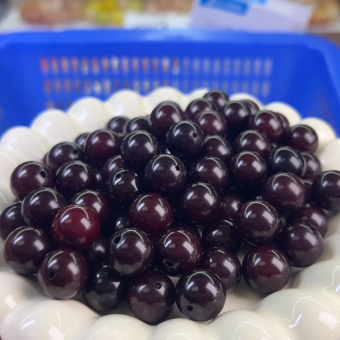 菩提根/象牙果手串卡14车里子圆120颗个别有几个不通孔的