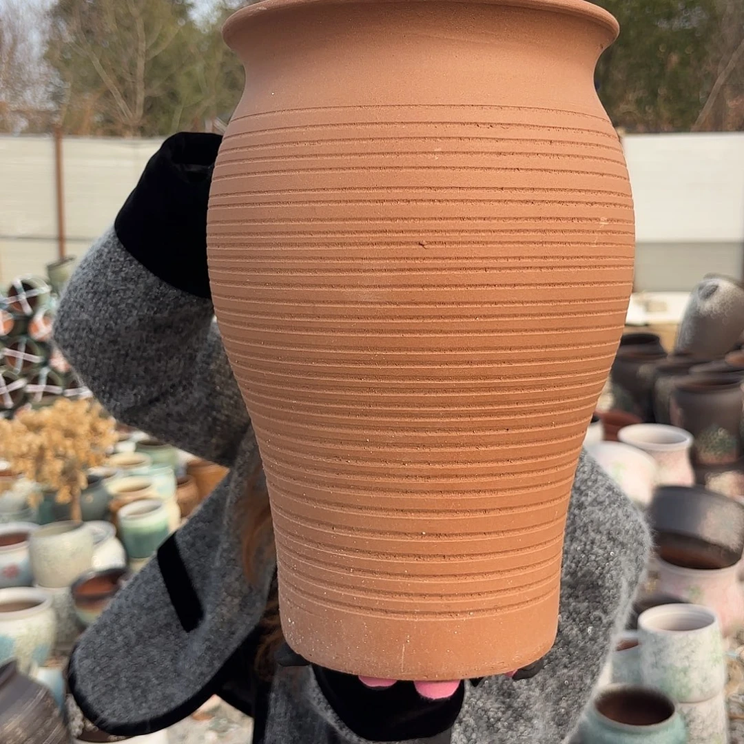 口径20高度31 红陶鱼尾一个