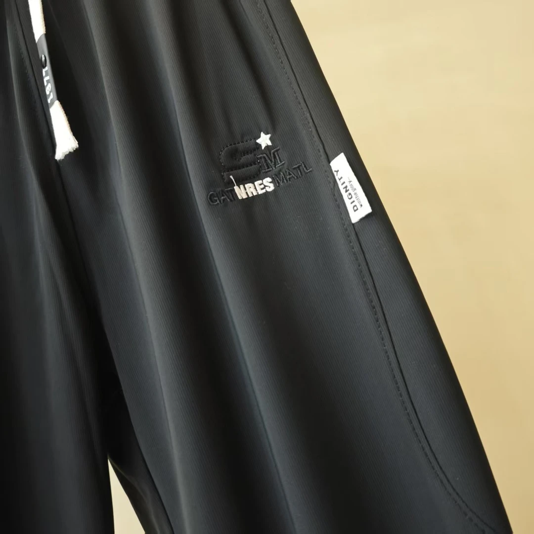 01黑色青少年时尚潮流束脚九分速干裤