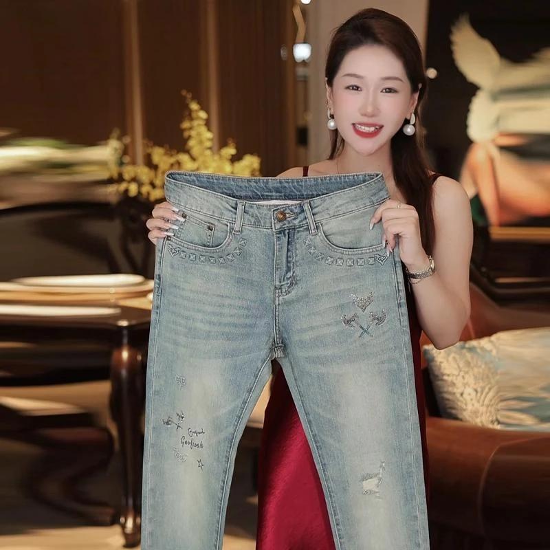 夏季薄款新款轻奢清爽蓝烫钻破洞男士修身牛仔裤时尚潮流百搭潮牌