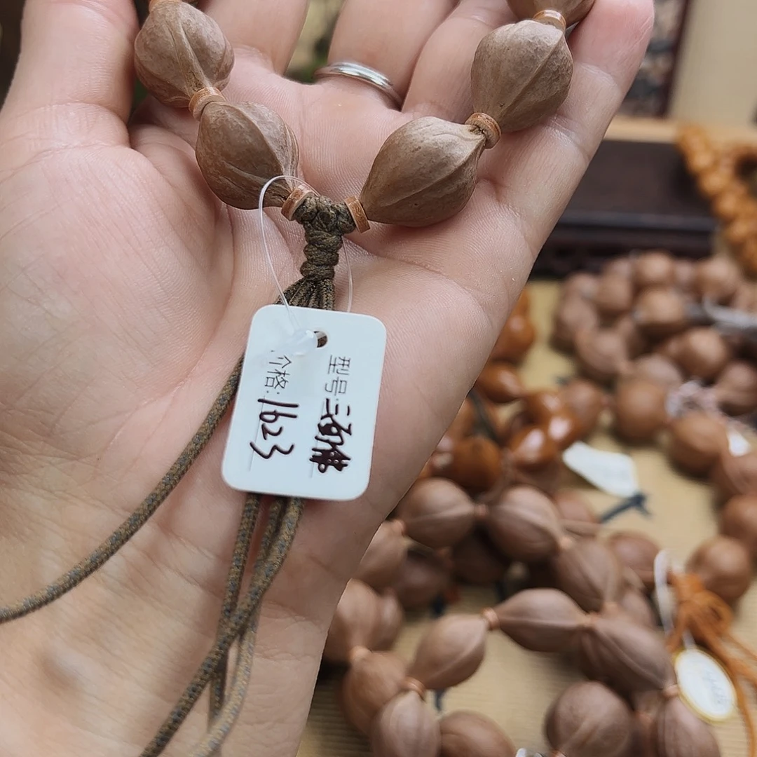 啾****橄榄核吊坠梅林铁核1623三面佛