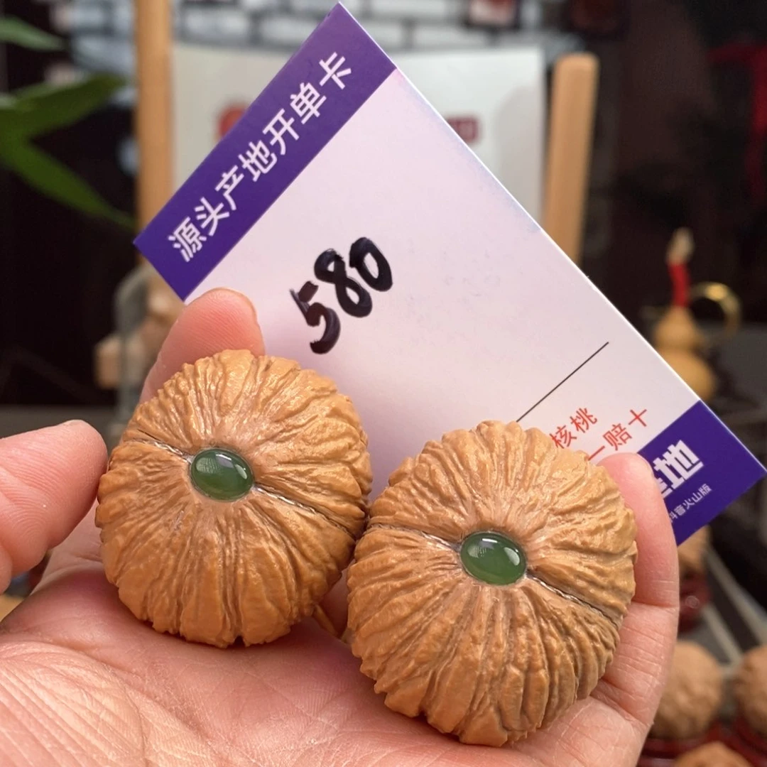 文玩核桃把件40埋银线镶嵌猴头元宝580号