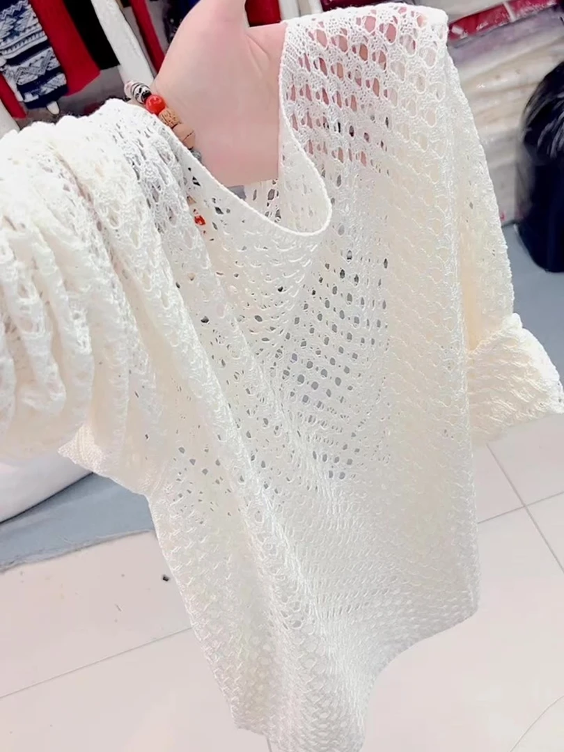 百搭温柔风白色长袖镂空针织衫新款气质减龄显瘦上衣女2025年秋季