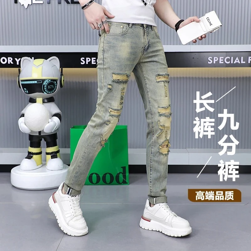 夏季薄款高端男士牛仔裤子潮流假破洞个性百搭修身小脚九分/长裤