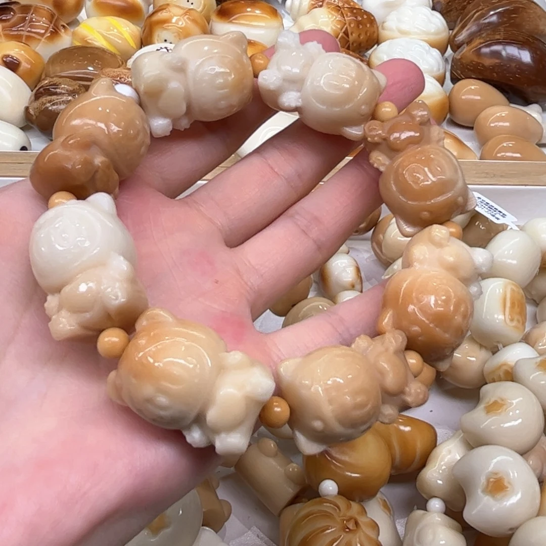 菩提根/象牙果手串8.4.24象牙果恐龙拉布布微瑕