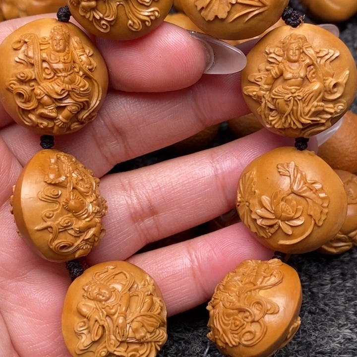 橄榄核手串可怜来咯偶来咯哦