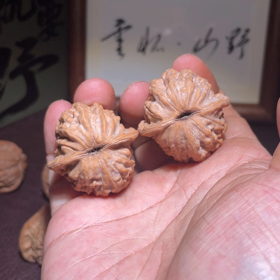 寒***雪文玩核桃佛光鸡心