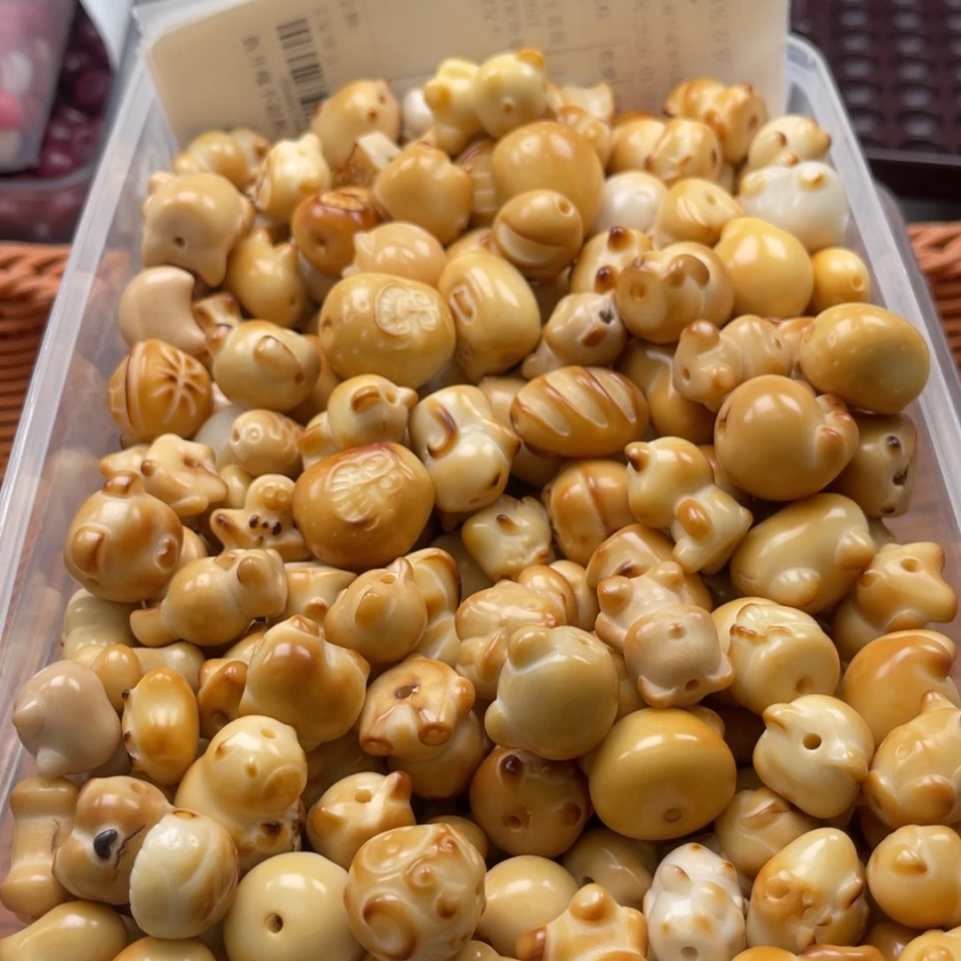 吊坠白玉菩提y x34/20以下/5颗炭烧象牙果瑕发不一样