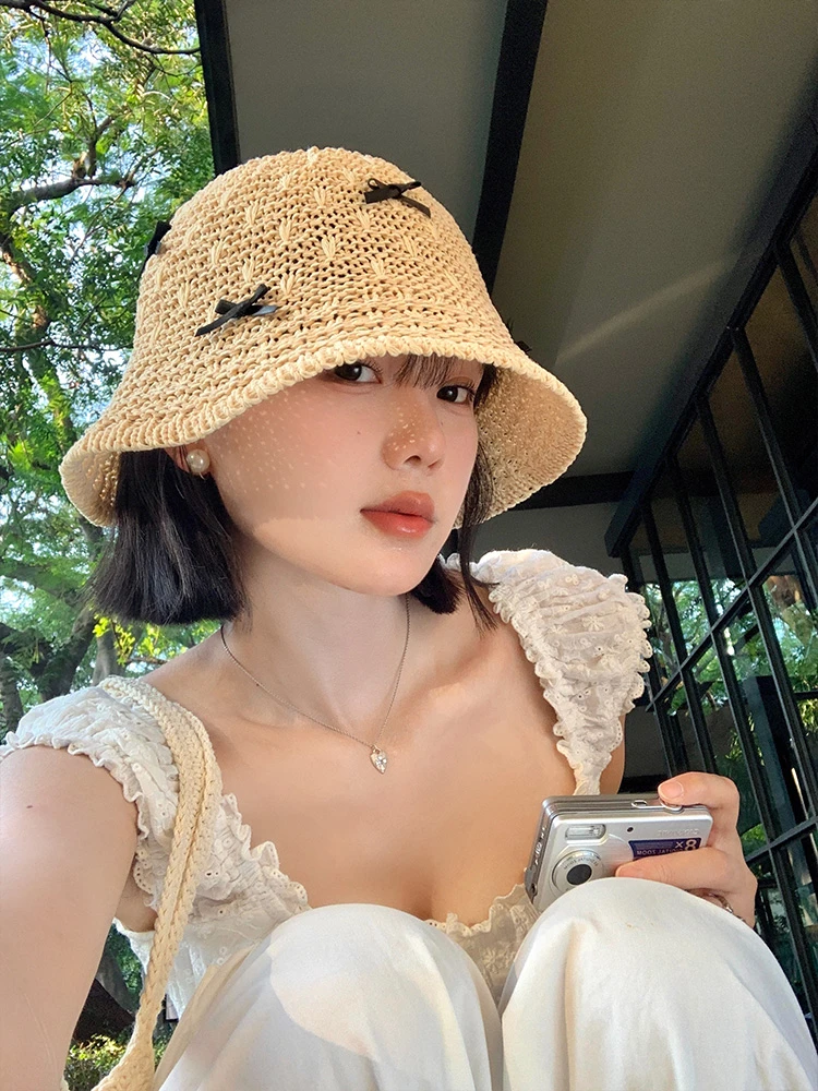 甜美蝴蝶结手工编织渔夫帽子女夏季镂空透气海边遮阳防紫外线盆帽