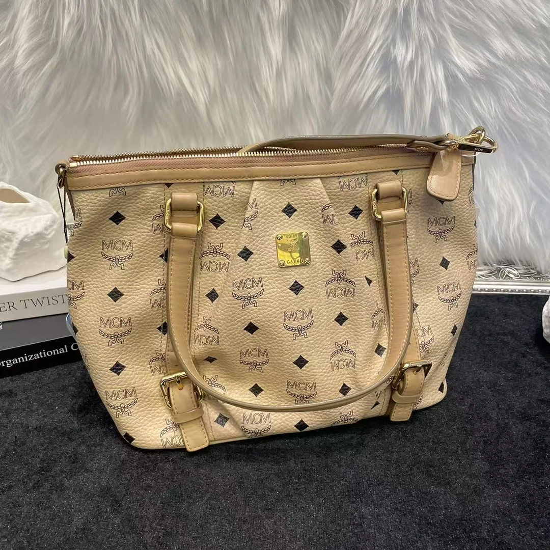 95新 MCM 嘻总/95新/25851/单肩包