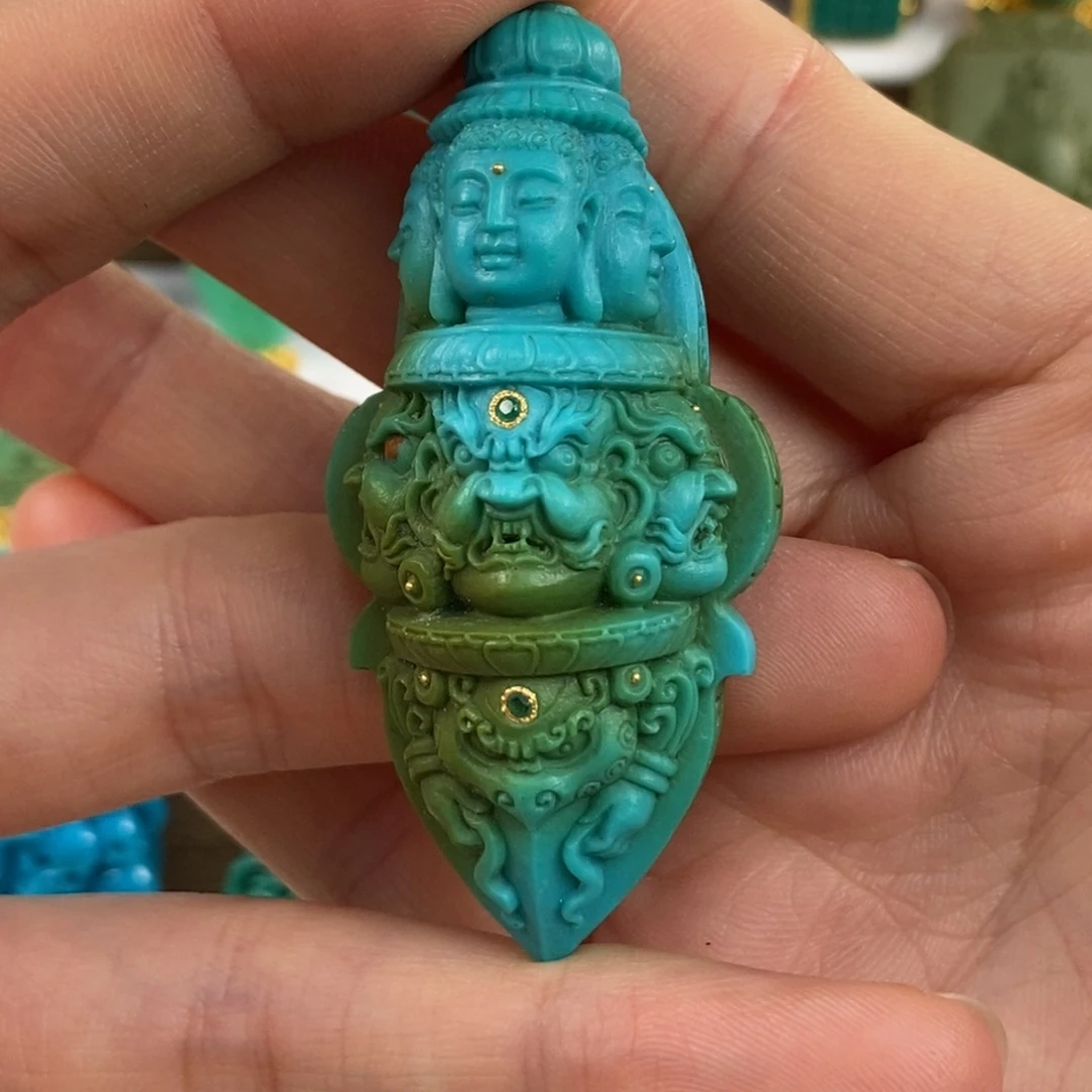 绿松石未镶嵌。三面杵