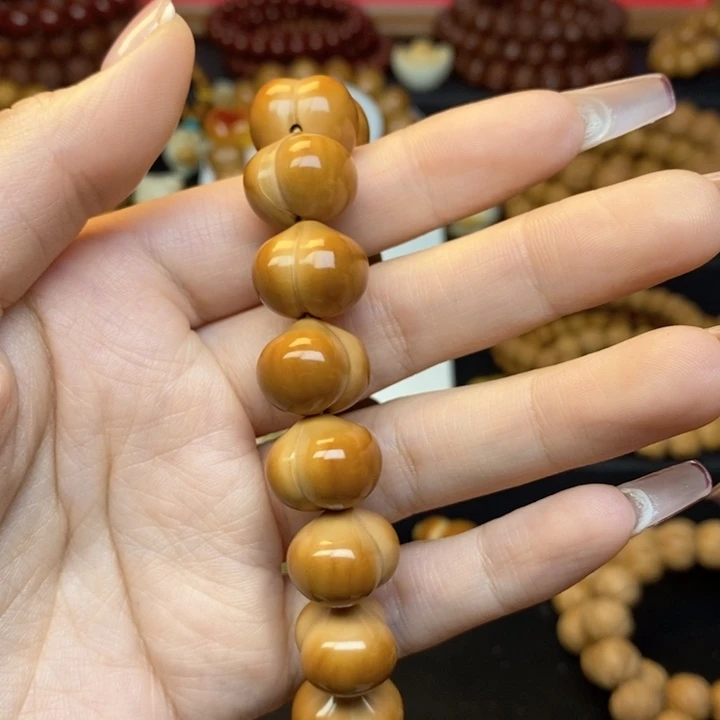 .***.猴头核桃吊坠全品16屁桃手持