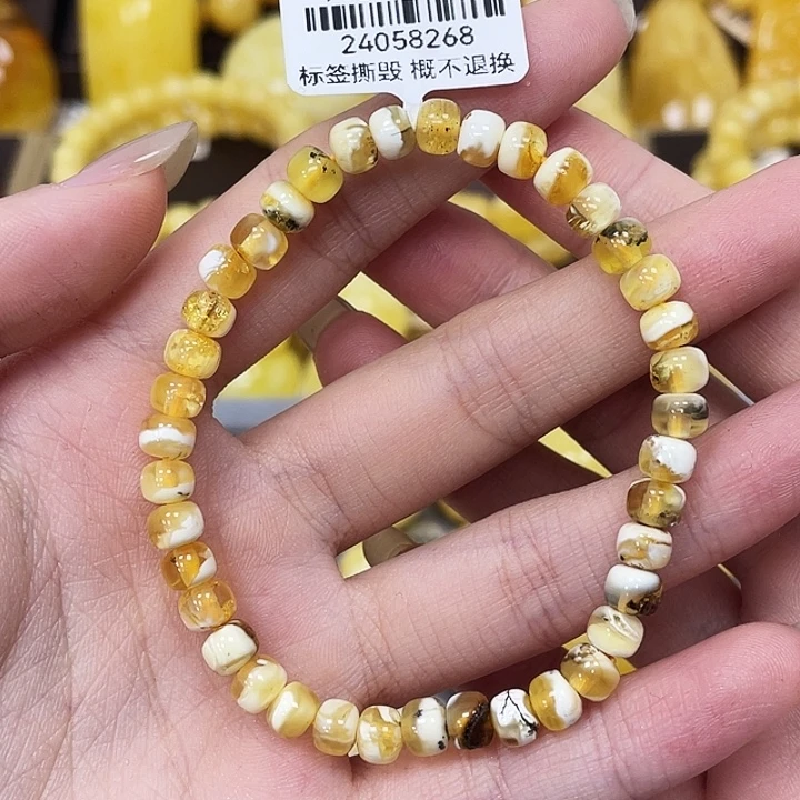 琥珀未镶嵌裸石5.7mm老型手串瑕 82