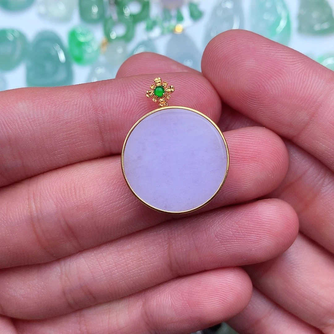 翡翠吊坠(不含链)18K金镶嵌波****?