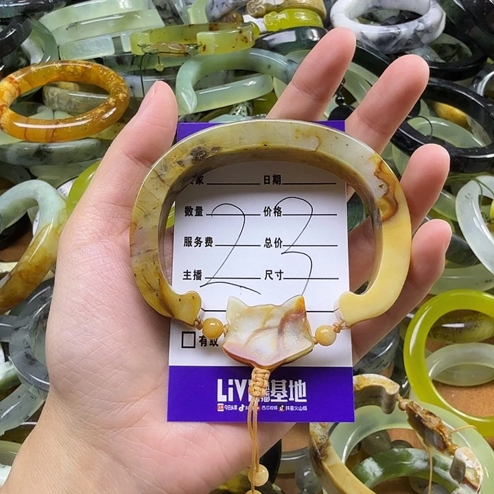 浦***染蛇纹石玉未镶嵌手镯
