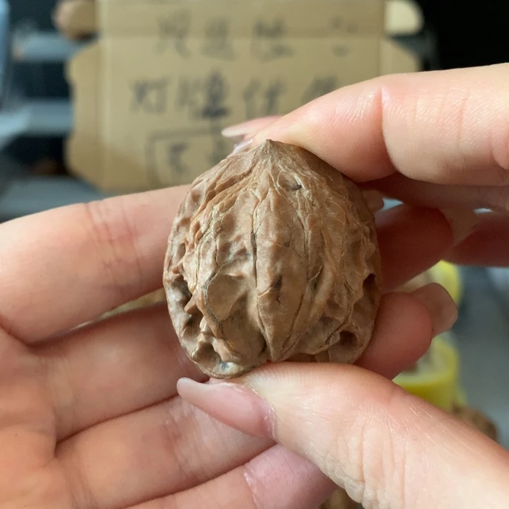 善***使吊坠文玩核桃异形单只，有瑕疵