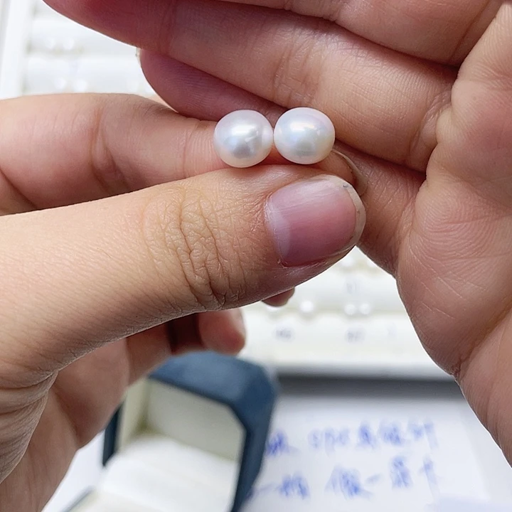 淡水珍珠耳饰银S925镶嵌我****?