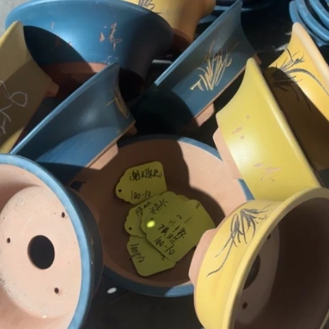 紫砂花盆50-5。  22-8